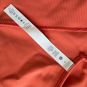 Lululemon coral colored deep V crop top